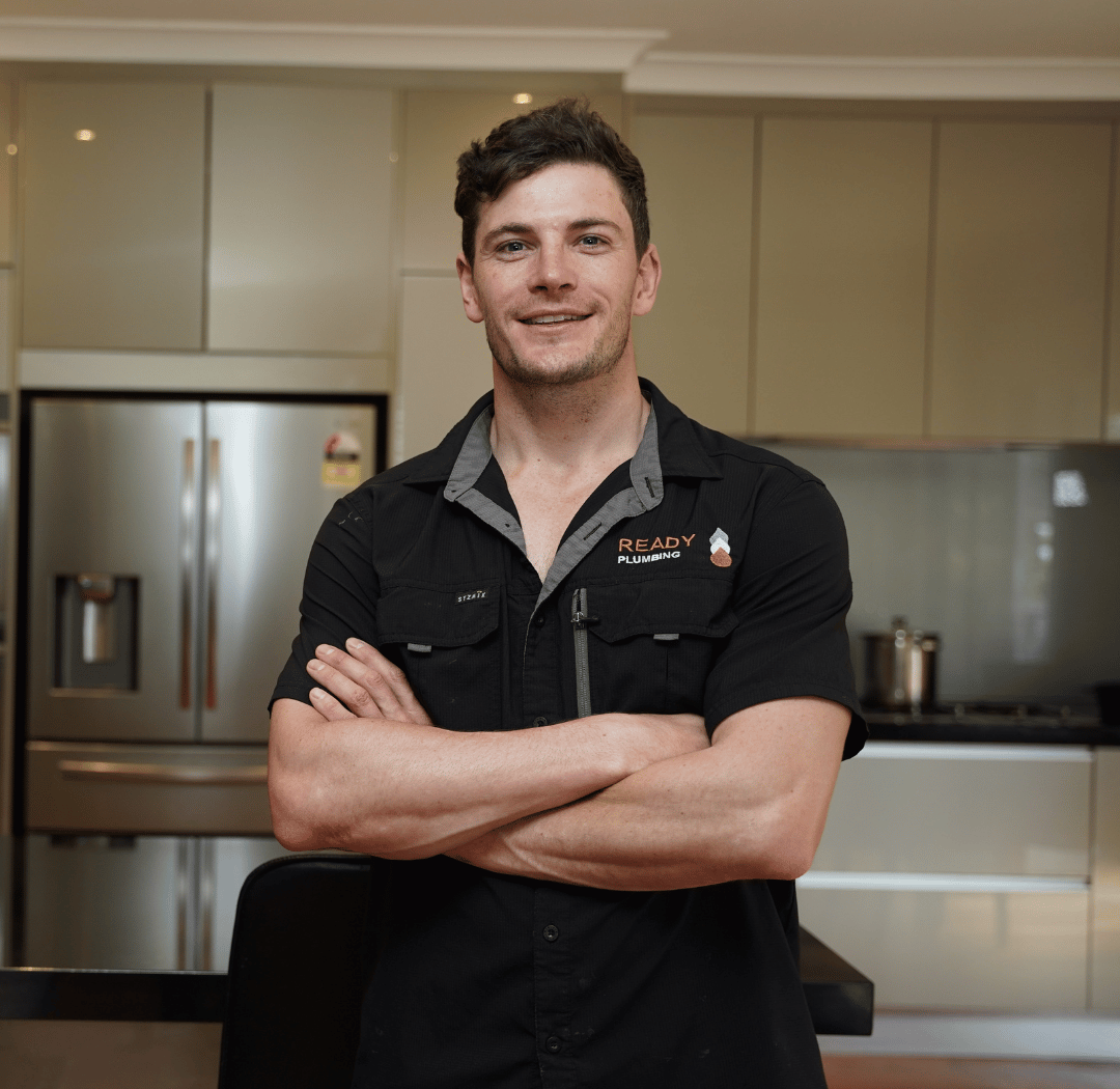 Nick Cavanagh, owner and master plumber at Ready Plumbing, in branded work shirt