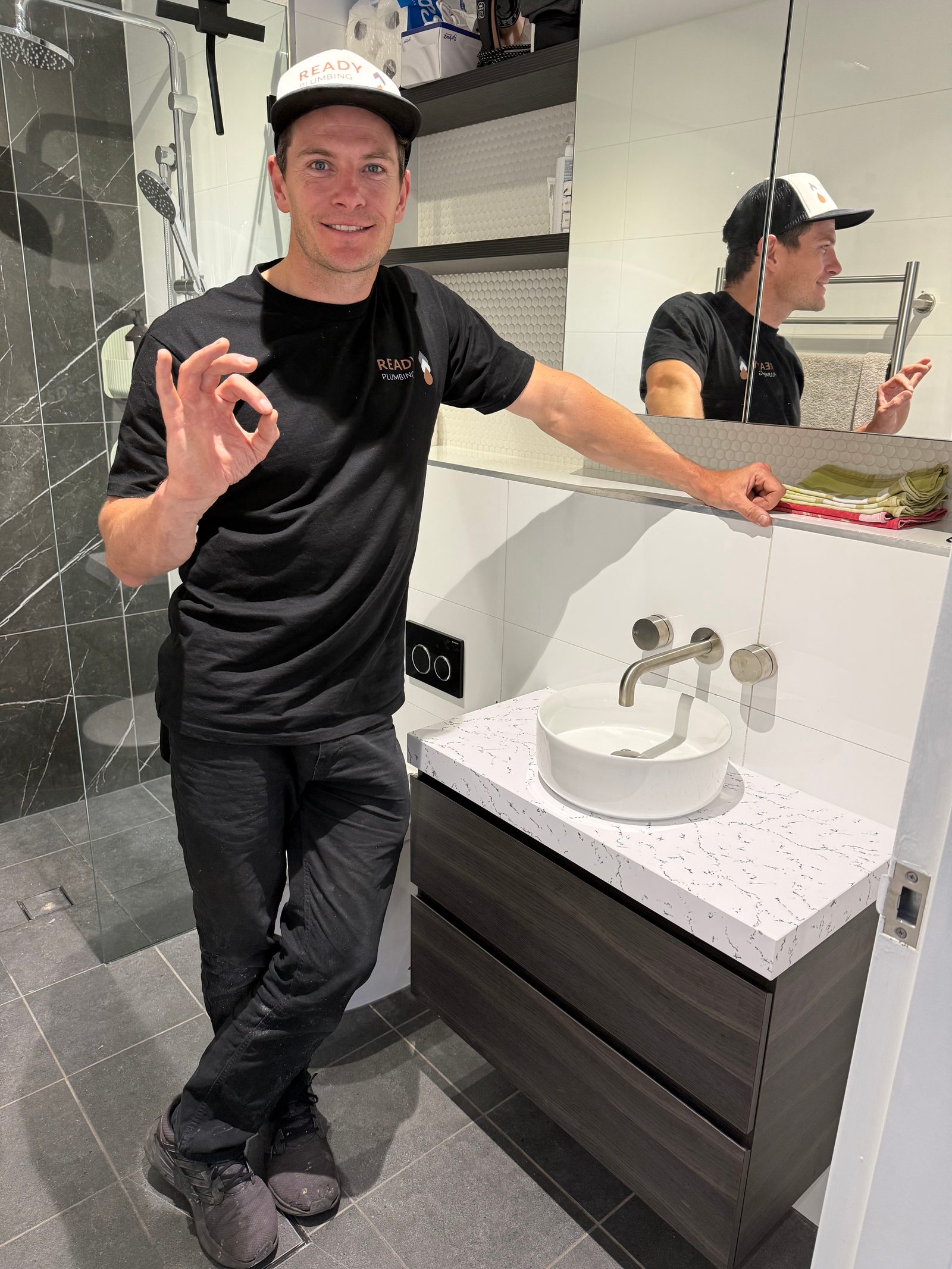 James from Ready Plumbing with the finished Timberline vanity and brushed nickel tapware