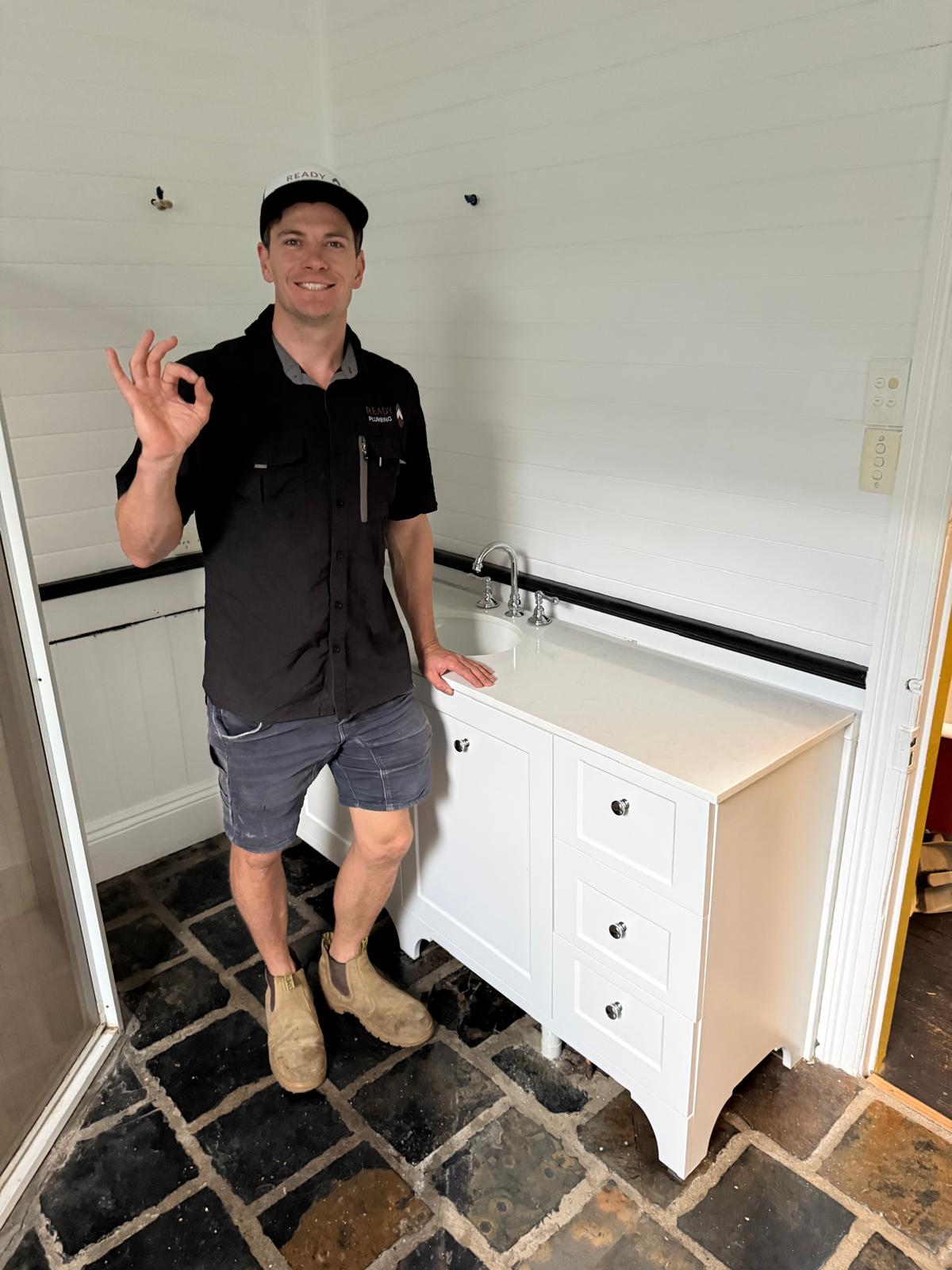 New vanity installed by Ready Plumbing with tapware connected and sealed