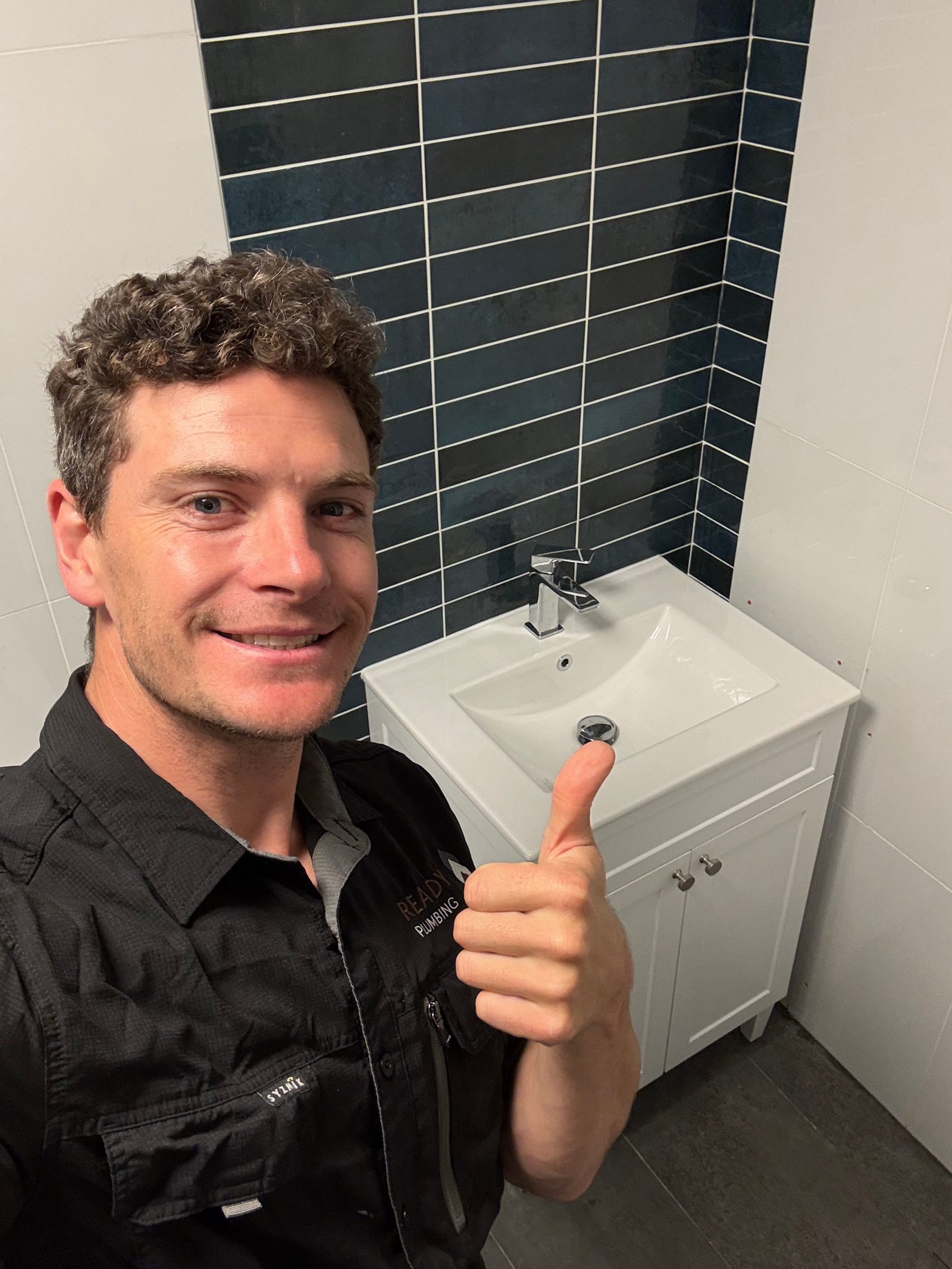 Nick from Ready Plumbing with the finished vanity install