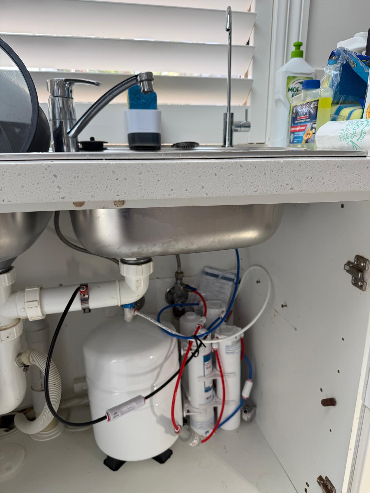 Under-sink reverse osmosis water filtration system with pressure tank installed by Ready Plumbing