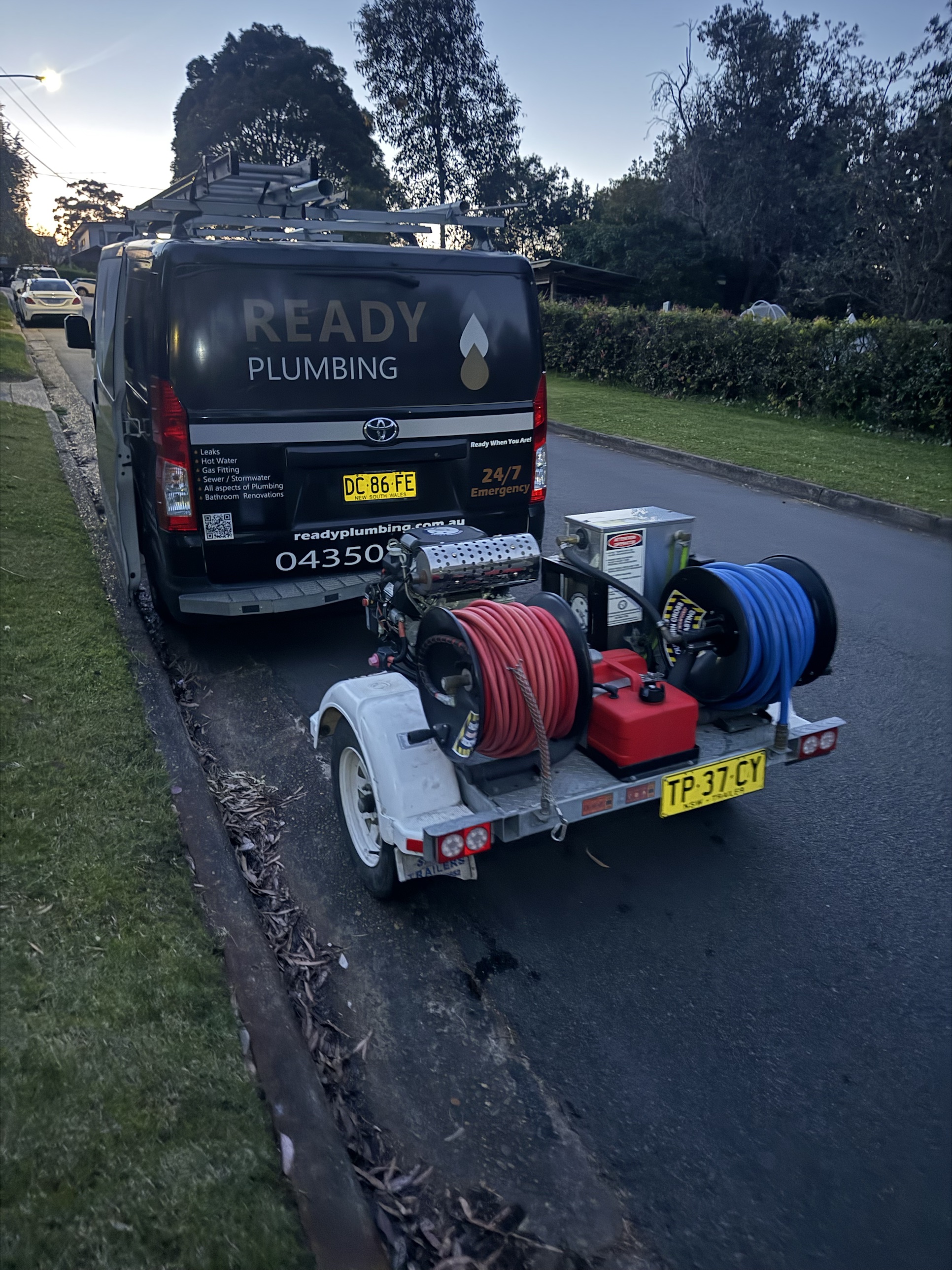 Ready Plumbing van and water jetter trailer set up on the street for the Seaforth call-out